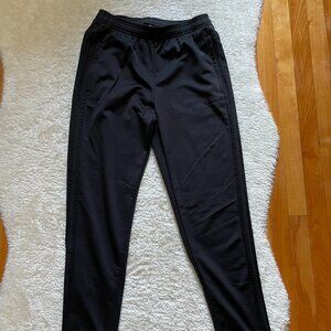 Women’s Adidas black tapered track pants, size medium